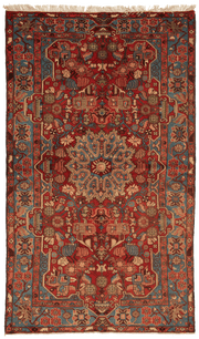 Tapis Nahavand Iran rouge avec médaillon central 257x158cm fait main avec motifs persans traditionnels
