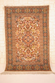 Tapis Cachemire orange 180 × 123 cm, vue d'ensemble du champ ivoire fleuri et des franges