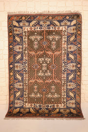 Tapis Dodgem Alti marron 187 × 130 cm, vue d'ensemble du champ brun-olive et des franges écrues