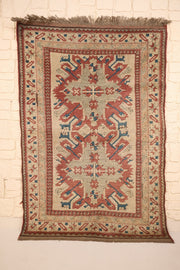 Tapis Kars rouge et beige 180 × 123 cm, vue d'ensemble avec ses franges