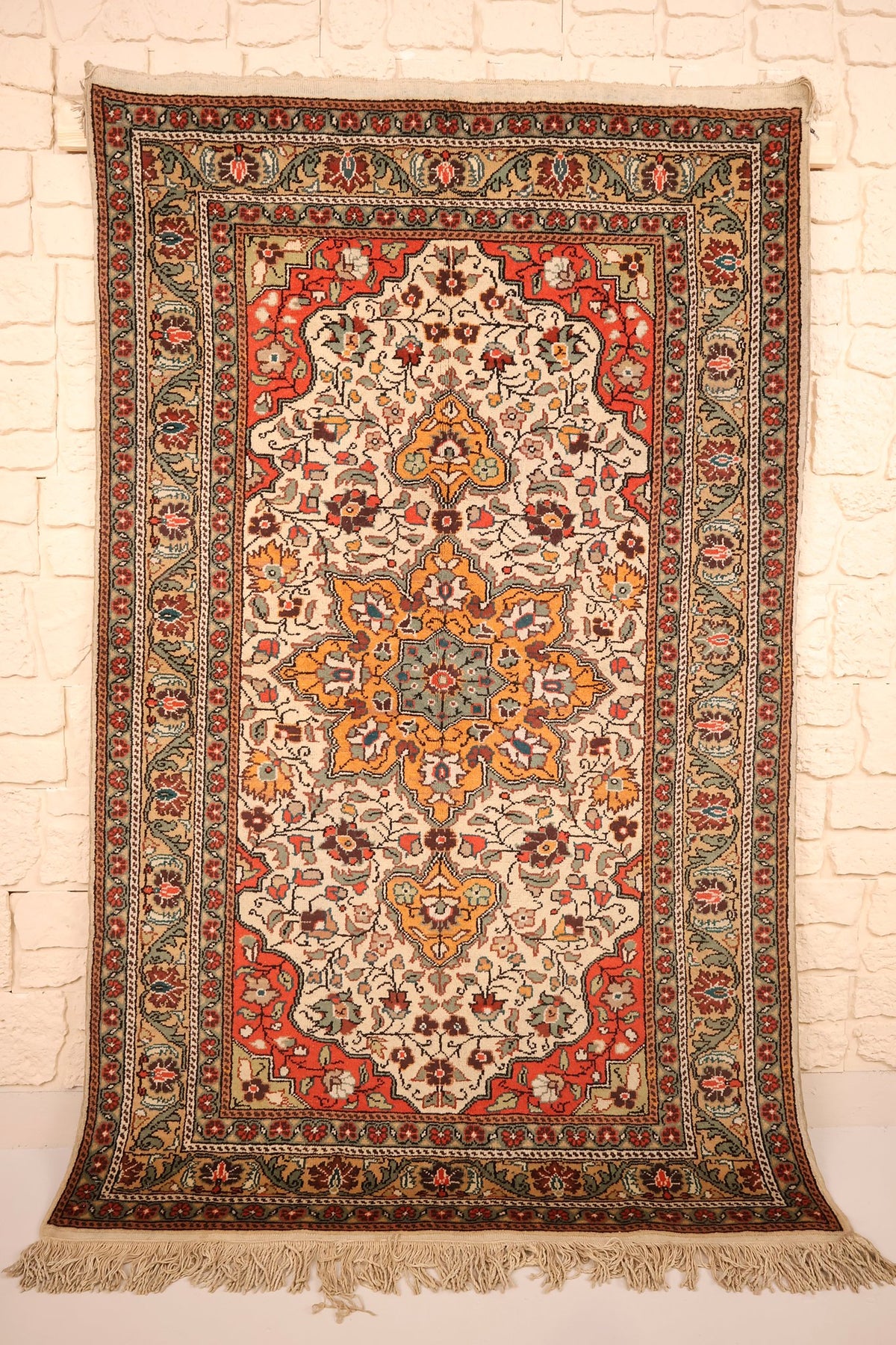 Tapis Kayseri beige 180 × 120 cm, vue d'ensemble du champ ivoire fleuri et des franges