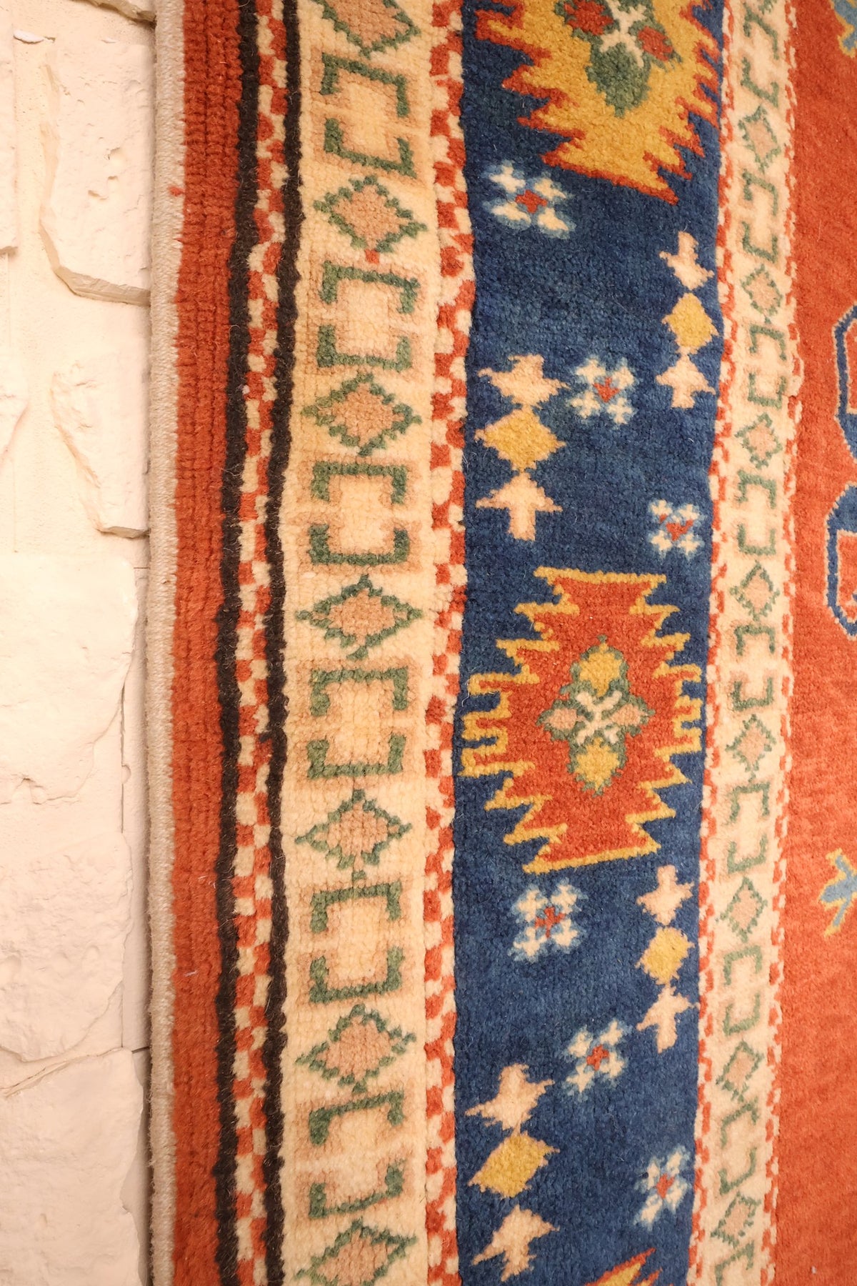 Lisière du tapis Konya 229 × 163 cm, contre-bordures ivoire en laine