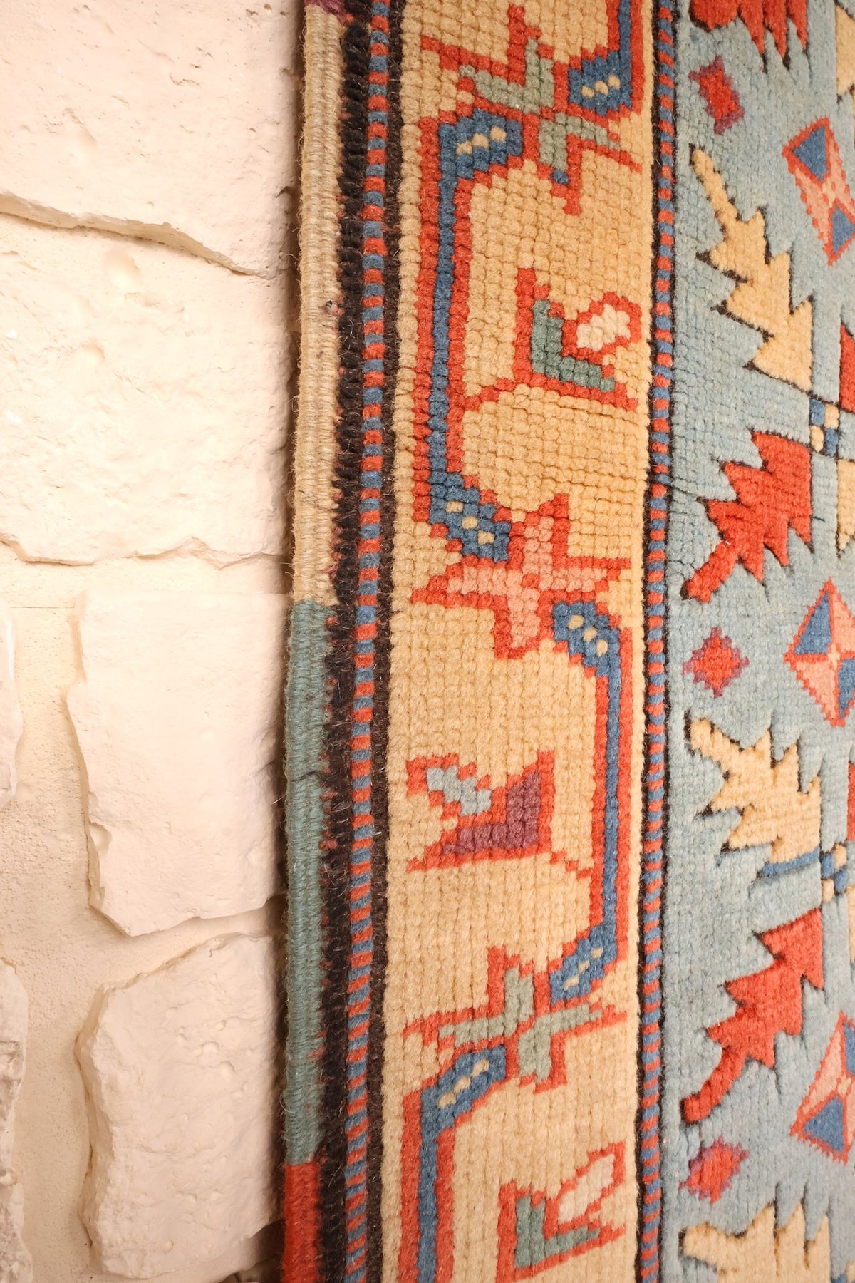 Lisière du tapis Konya en laine, contre-bordure beige et bleu-gris