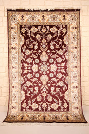 Tapis P. rouge bordeaux 187 × 119 cm, vue d'ensemble du semis floral et des franges