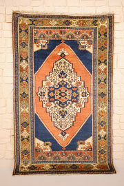 Tapis Tachpinar orange et bleu 172 × 110 cm, vue d'ensemble du médaillon losangé