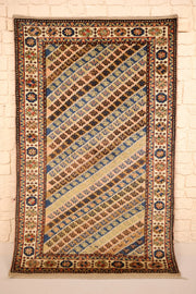 Tapis Tachpinar beige 177 × 110 cm à bandes diagonales bleues et orangées, vue d'ensemble