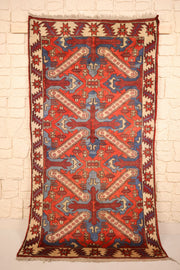 Tapis Yagci Bedir rectangulaire rouge, bleu et beige 187 × 98 cm, vue d'ensemble de face