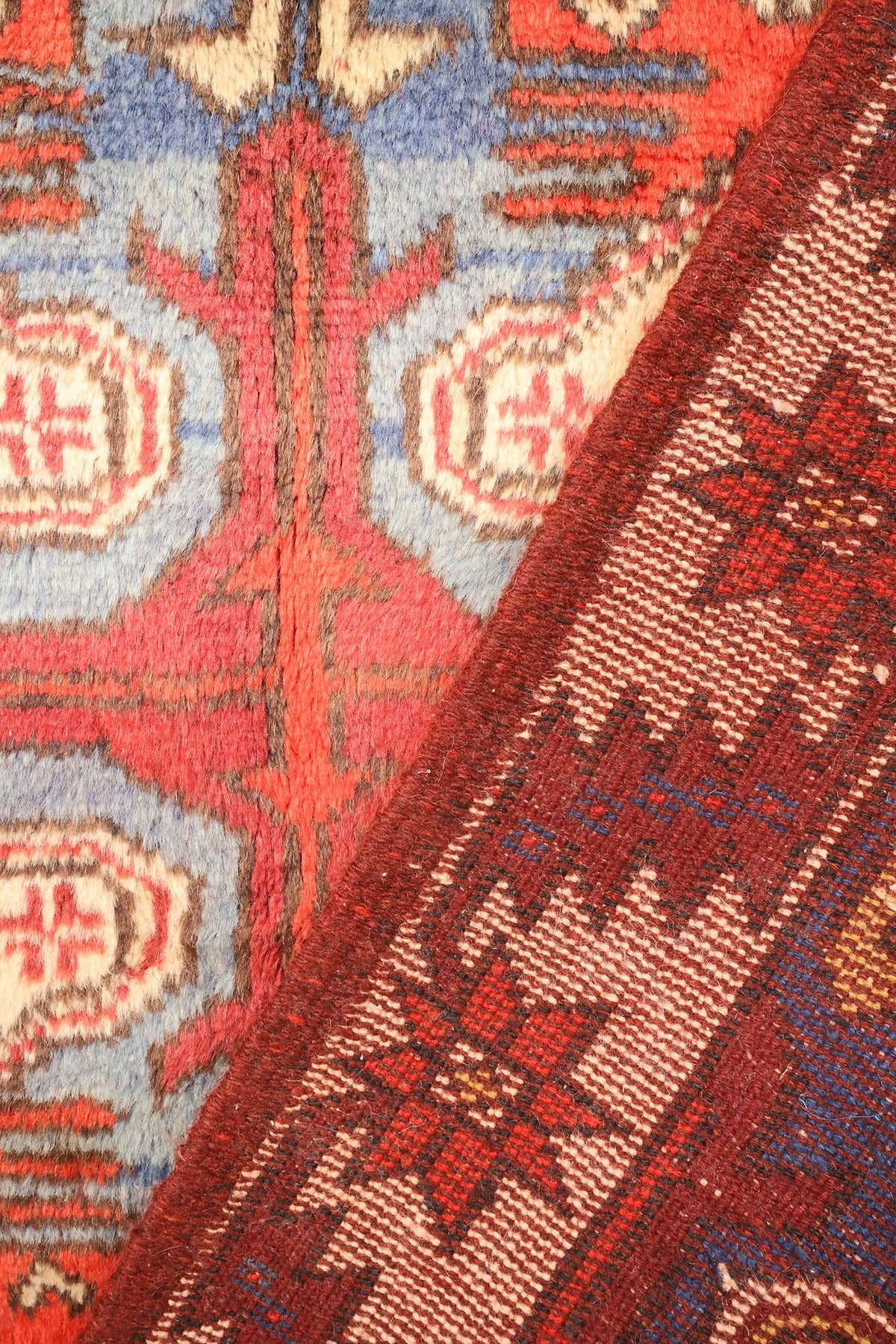 Envers du tapis Yagci Bedir 187 × 98 cm, nœuds et dessin géométrique visibles au dos