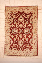 Tapis Ziegler rouge et beige 153 × 101 cm, vue d'ensemble du semis floral